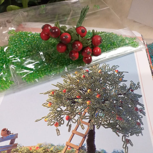 meline rosse perline verdi ambientazione melo bonsai alberello perle veneziane conteria rocailles pianta da frutta