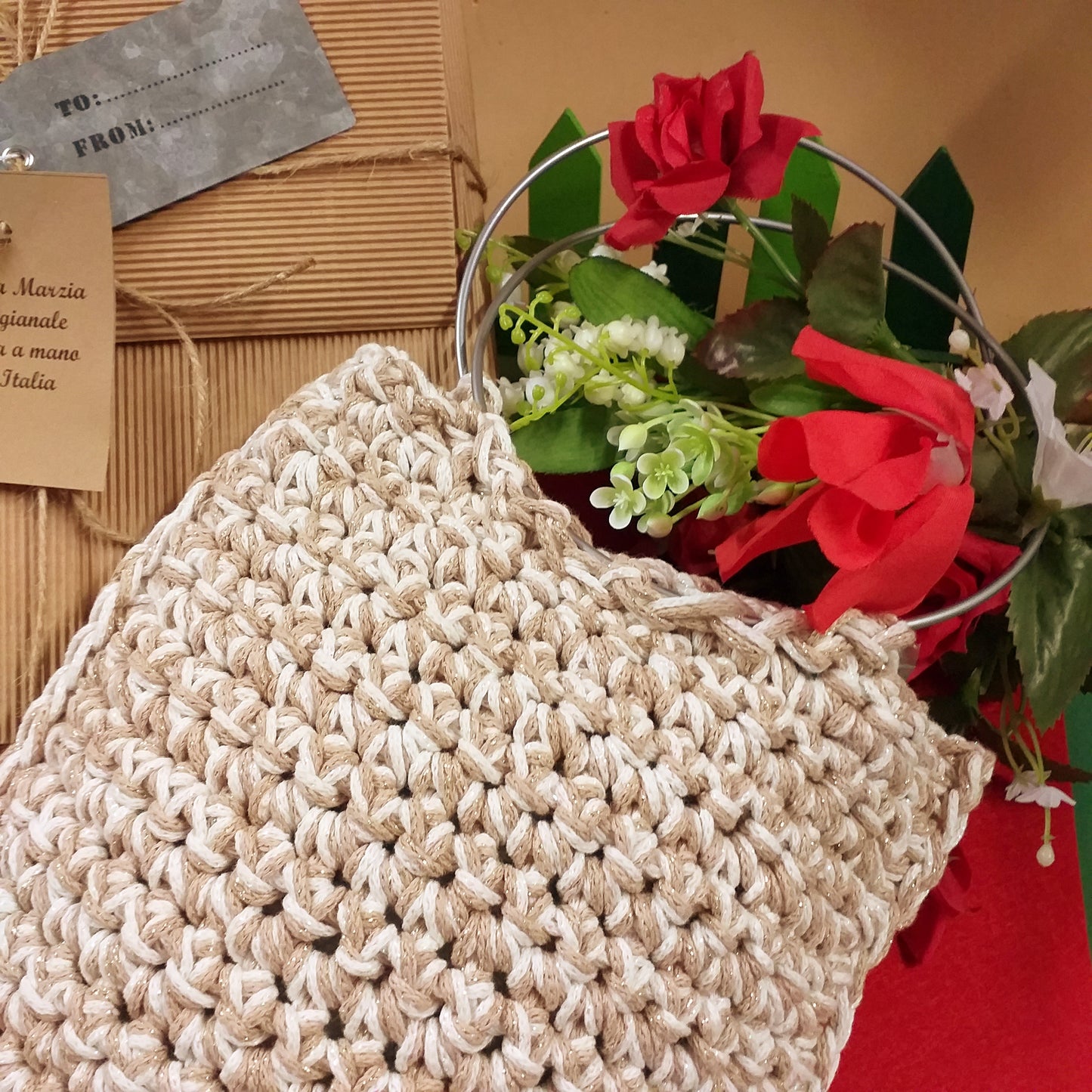 dettagli borsa Marzia artigianale uncinetto crochet bag pochette di corda cotone green macramè cordino manici cerchio metallo colore argento uso borsetta da giorno sera elegante cerimonia
