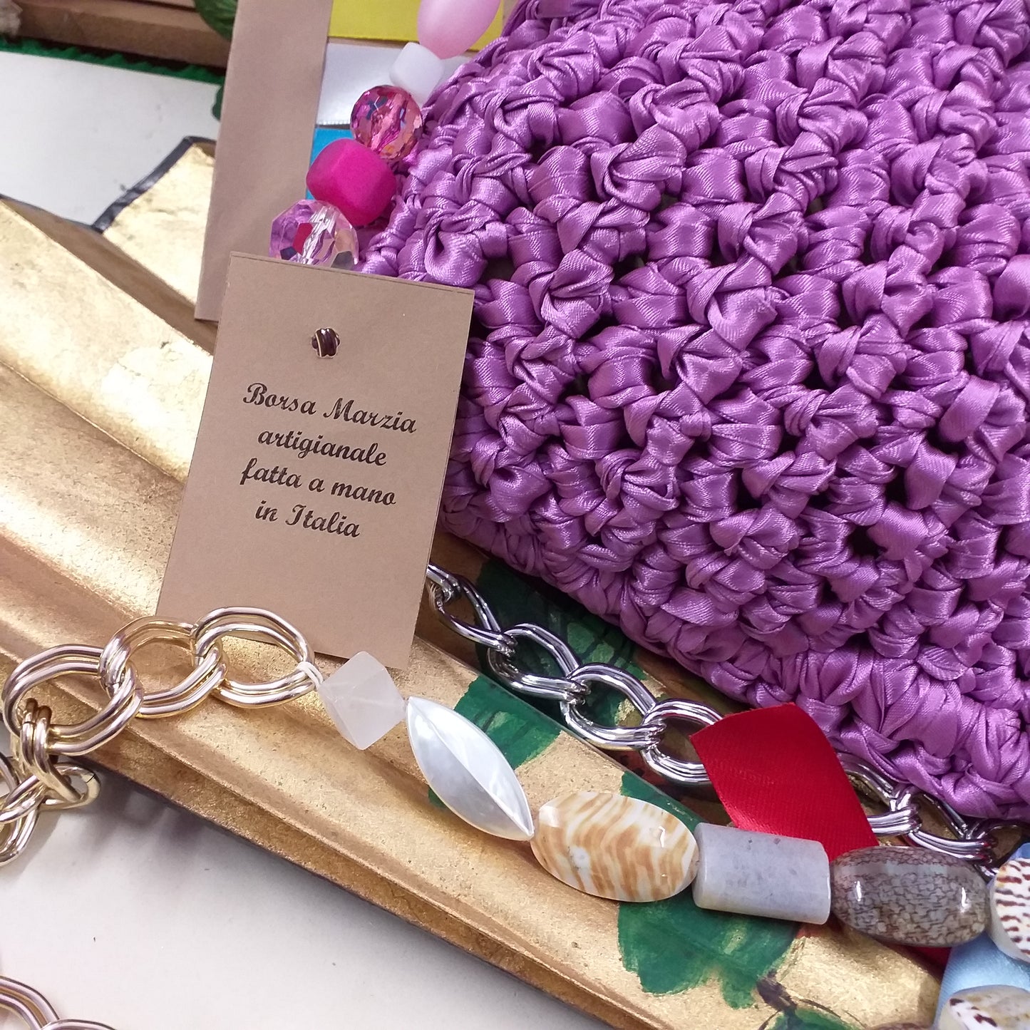 Marzia borsa artigianale di fettuccia raso nastro fatta a mano uncinetto crochet Italia pochette cerimonia giorno sera matrimonio manico gioiello perle catena conchiglie pietre fashion moda estate