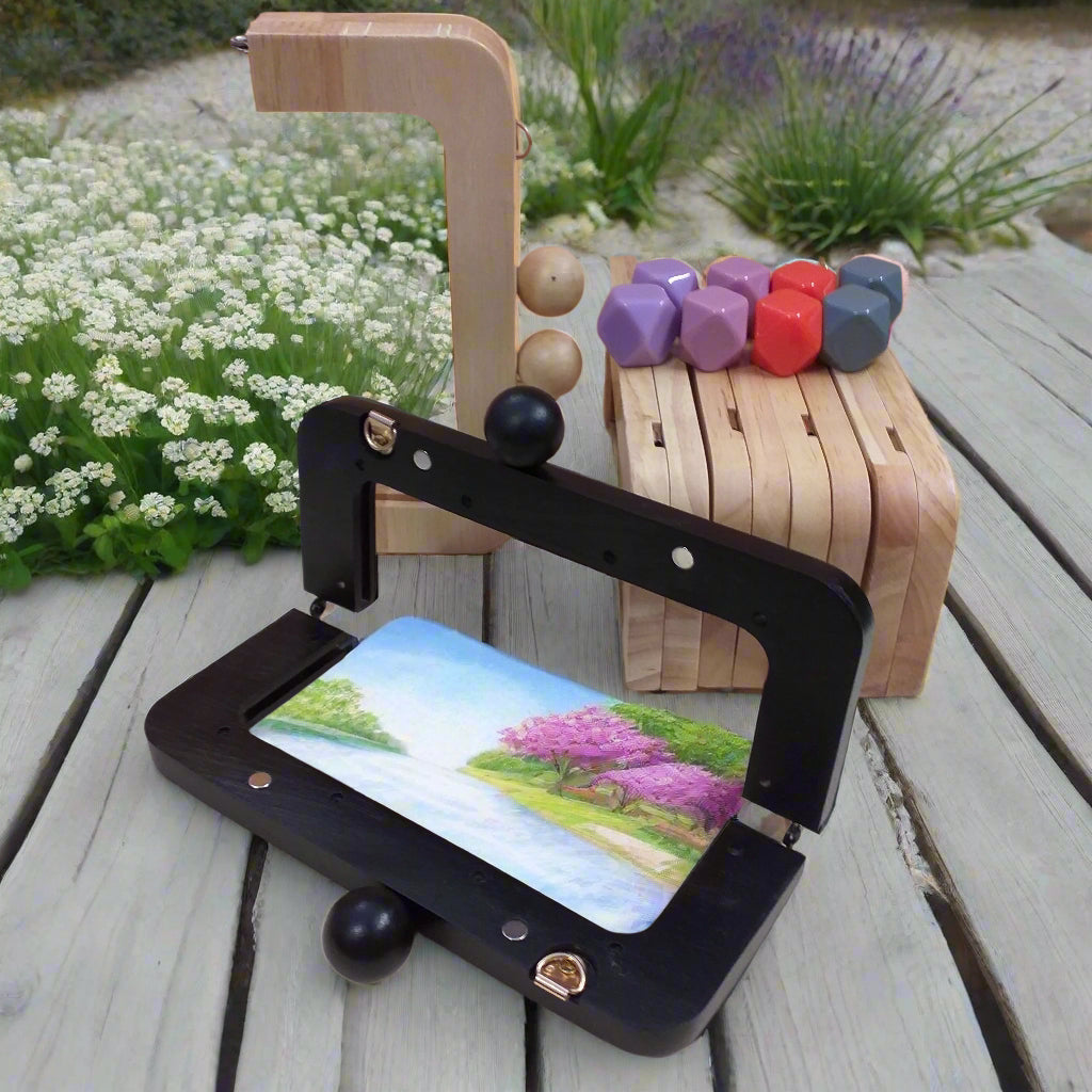 palline pomelli rosa-lilla glicine arancio grigio avio pomoli colorati chiusure clic clac legno naturale nero wooden clutch bags per borse uncinetto pochette da sera cerimonia lavoro a maglia artigianale telaio aperto con viti