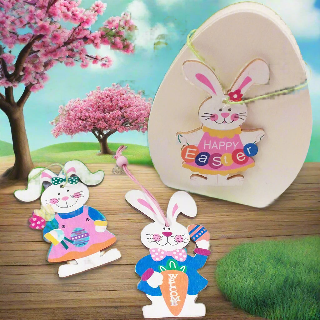 uovo legno ciondoli coniglietti pasquali colorati arancio rosa blu happy easter scritta welcome uova fiori uso packaging segnaposto idea regalo sorpresa ovetti cioccolato gadget souvenir
