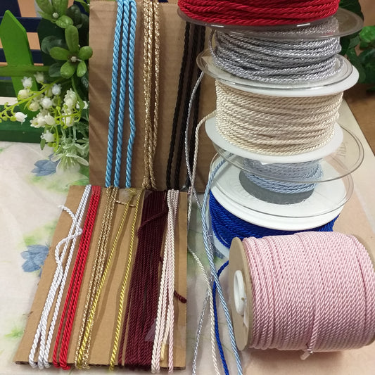 celeste nero oro rosso bianco bordeaux crema argento bluette rosa cordino intrecciato colori negozio cordoncini passamaneria copripunto cucito creativo bambole fai da te bomboniere uso hobbistica packaging vetrinistica lavorazione borse bigiotteria