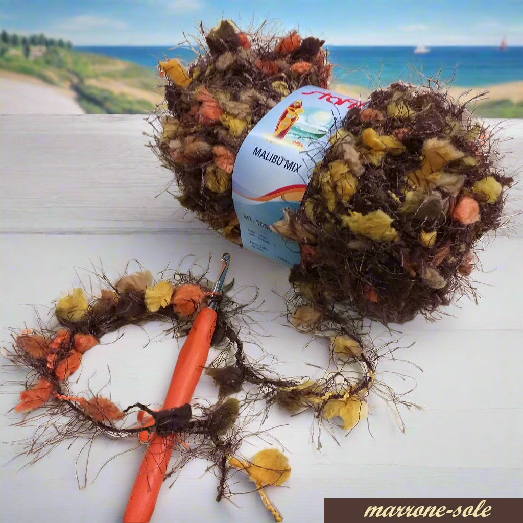 marrone lana con frange colori autunnali Stafil cordino fantasia pelosetto pelliccioso ecologico cordoncino per uncinetto borse scaldacollo pochette clutch bags sciarpe stole invernali