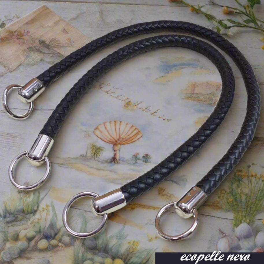 colore nero coppia manici ecopelle intrecciata con attacchi finali per borse artigianali uncinetto pochette di stoffa tessuto ricamato clutch bags estive moda mare shopper di paglia rafia cordino