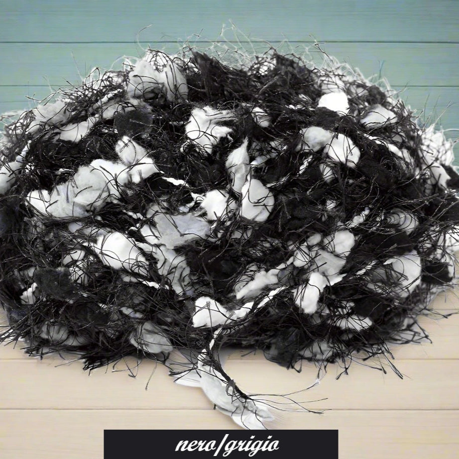 nero grigio Malibu mix stafil colori autunnali lana pompon sfrangiata cordino fantasia pelosetto pelliccioso ecologico cordoncino per uncinetto borse scaldacollo pochette clutch bags sciarpe stole autunnali invernali