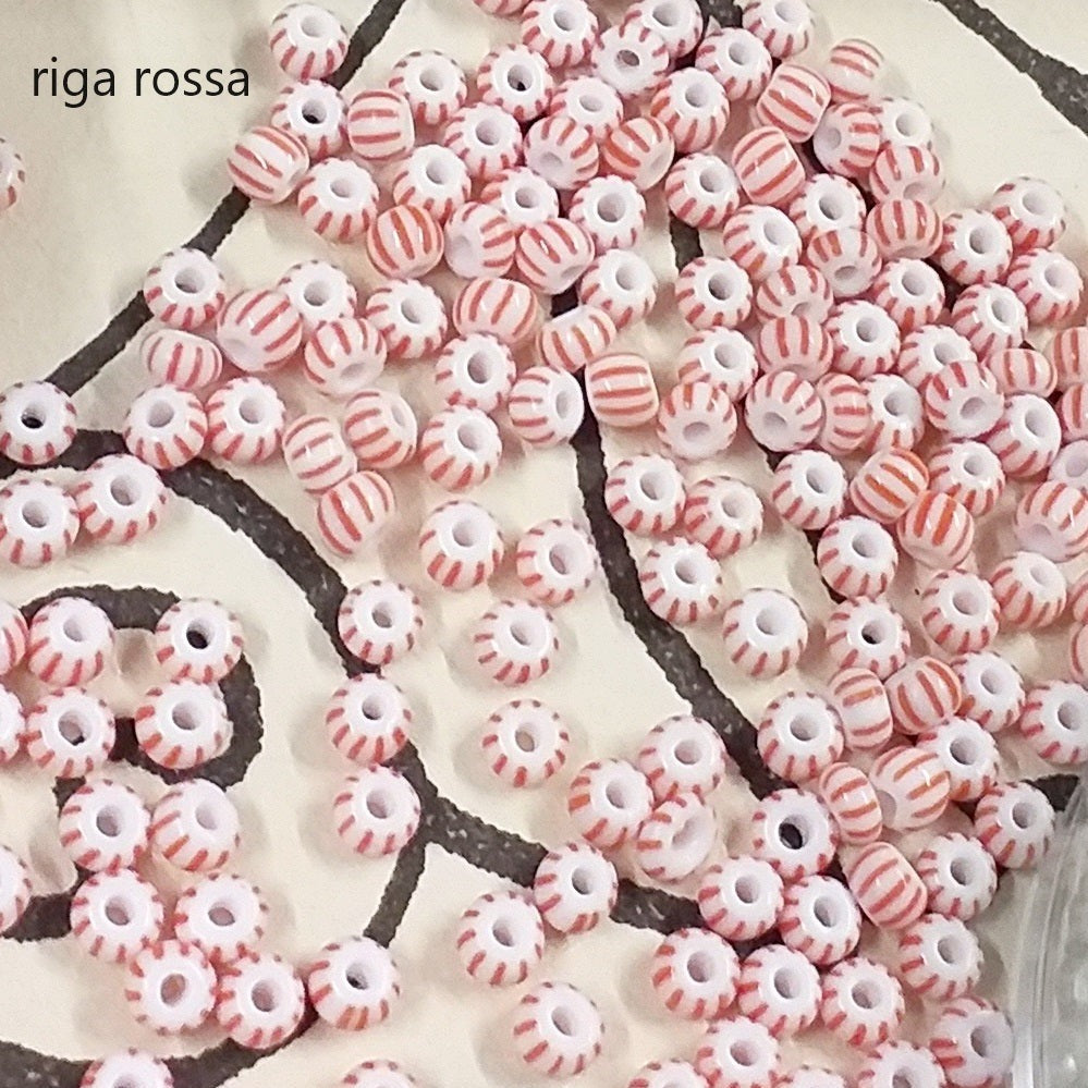 riga rossa rocailles in vetro perline indiane conteria veneziana hobby bijoux fiori Venezia piante alberi bonsai particolari esclusive per bigiotteria gioielli di perle