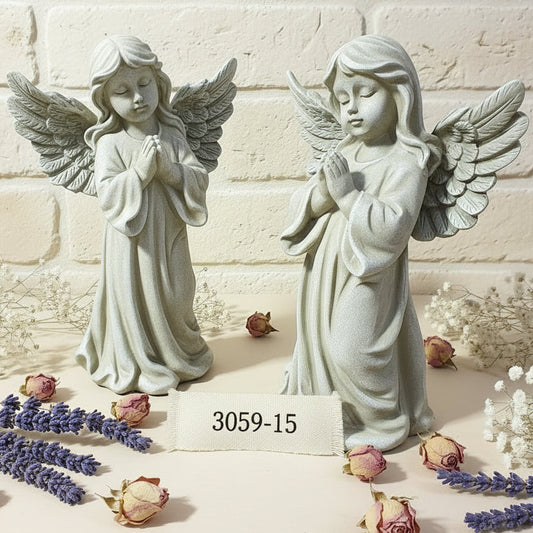 coppia angioletti che pregano grande statua angelo grigio idea regalo Natale ad uso decorazioni all'esterno in giardino arte funeraria cimitero lapidi tombe cappelle