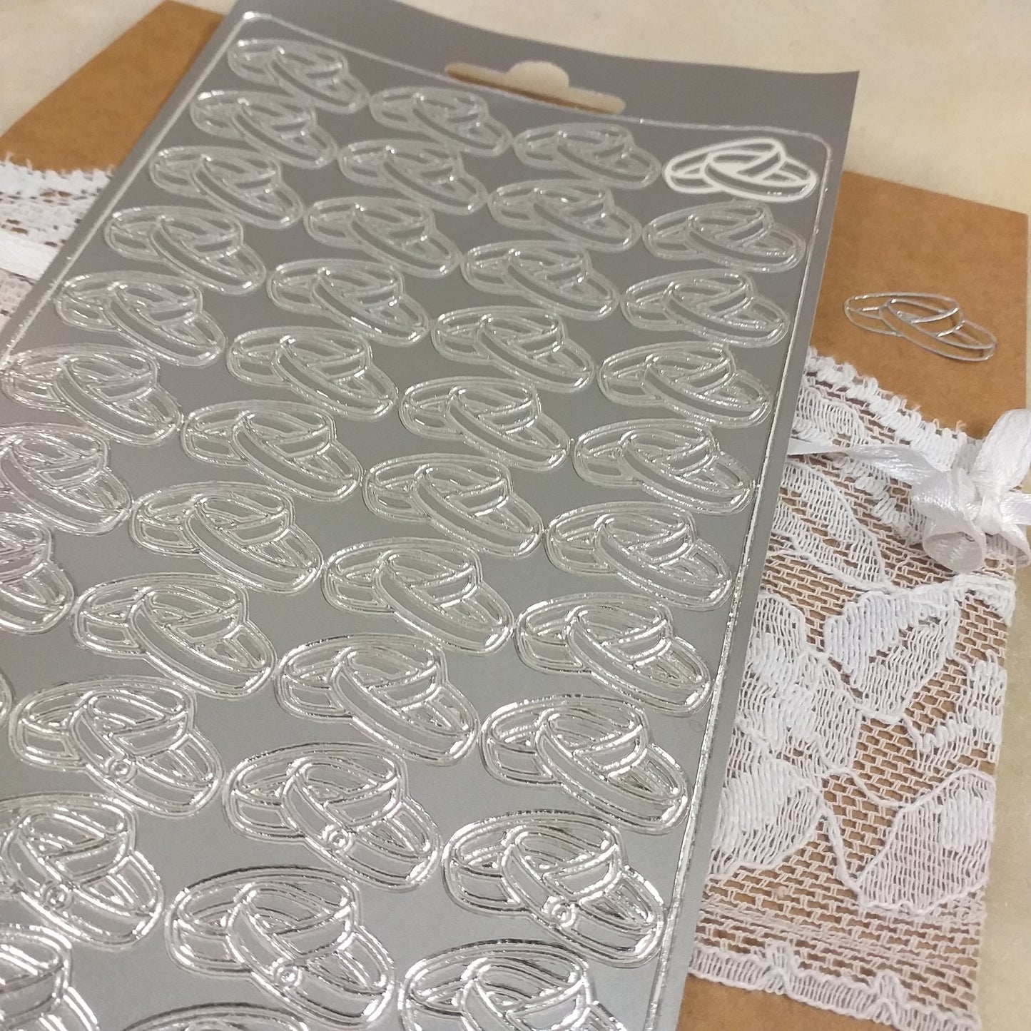 sticker bomboniere fai da te chiudibusta partecipazioni adesivi etichette chiudipacco bollini matrimonio anniversario nozze d'argento venticinquesimo simboli fedi argentate