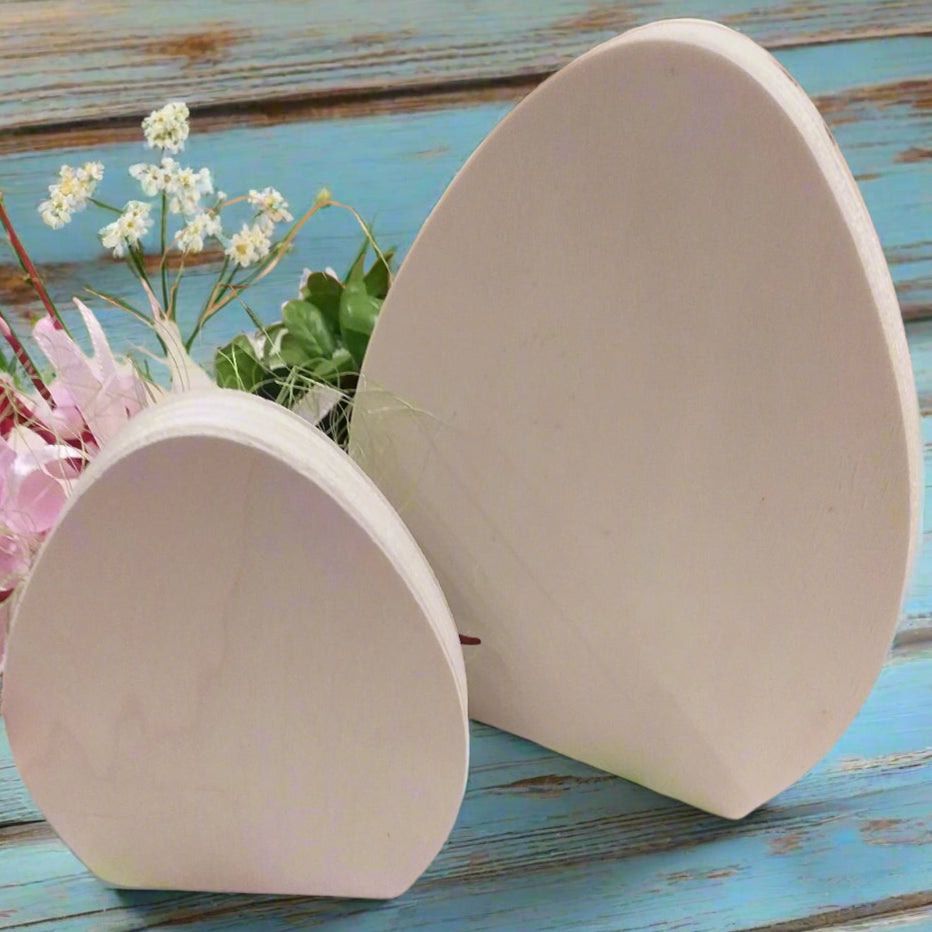 fiori di pesco ciliegio ambientazione allestimento vetrina uova piatte di legno sagome basi supporti sostegni grandi piccoli ovetti per centrotavola fuoriporta da decorare decoupage pannolenci colorare dipingere per addobbi decorazioni pasquali fai da te