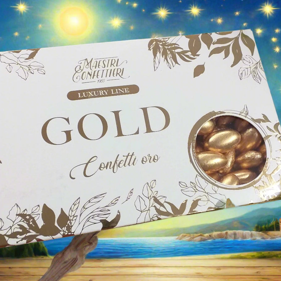 dettaglio finestra confetti oro incartati vendita scatola mezzo chilogrammo mandorla Maxtris maestri Confettieri luxury line gold anniversario matrimonio 50 anni nozze uso confettata fai da te confezionamento bomboniere