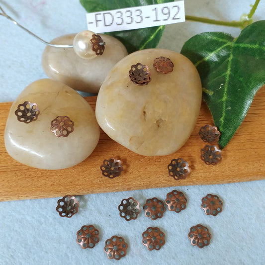 metallo rame negozio coppette bigiotteria fiori metallo cappette filigrana copriperla stelline collane uso fai da te bijoux angioletti