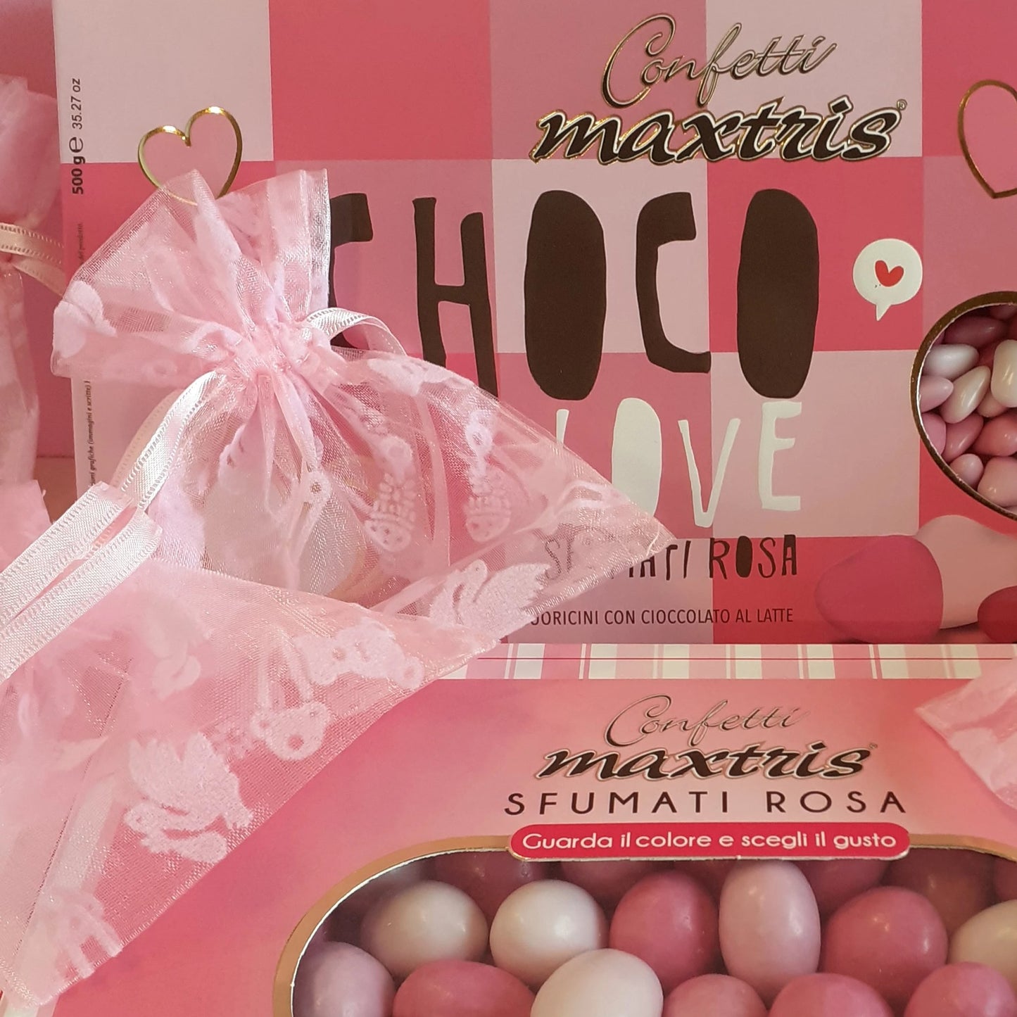 sacchettini organza confetti cioccolato cioccomandorla sfumati Maxtris confettata bimba nascita Battesimo