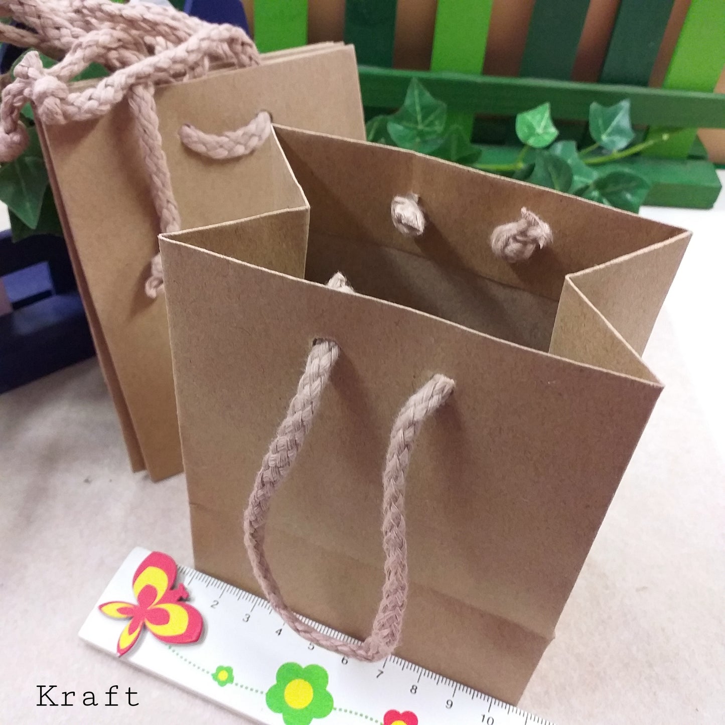 shopper sportina borsettina sacchetto di cartoncino beige avana kraft con manici corda grezza rustica per confezionamento packaging idee regalo pasquali bijoux di bigiotteria bomboniere