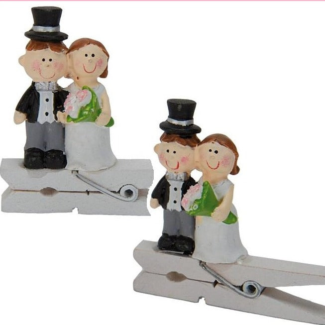 coppia sposini idea segnaposto matrimonio oggi sposi con mollette bomboniere fai da te decorative pinze legno mollettine chiudipacco packaging confezionamento hobbistica con statuette