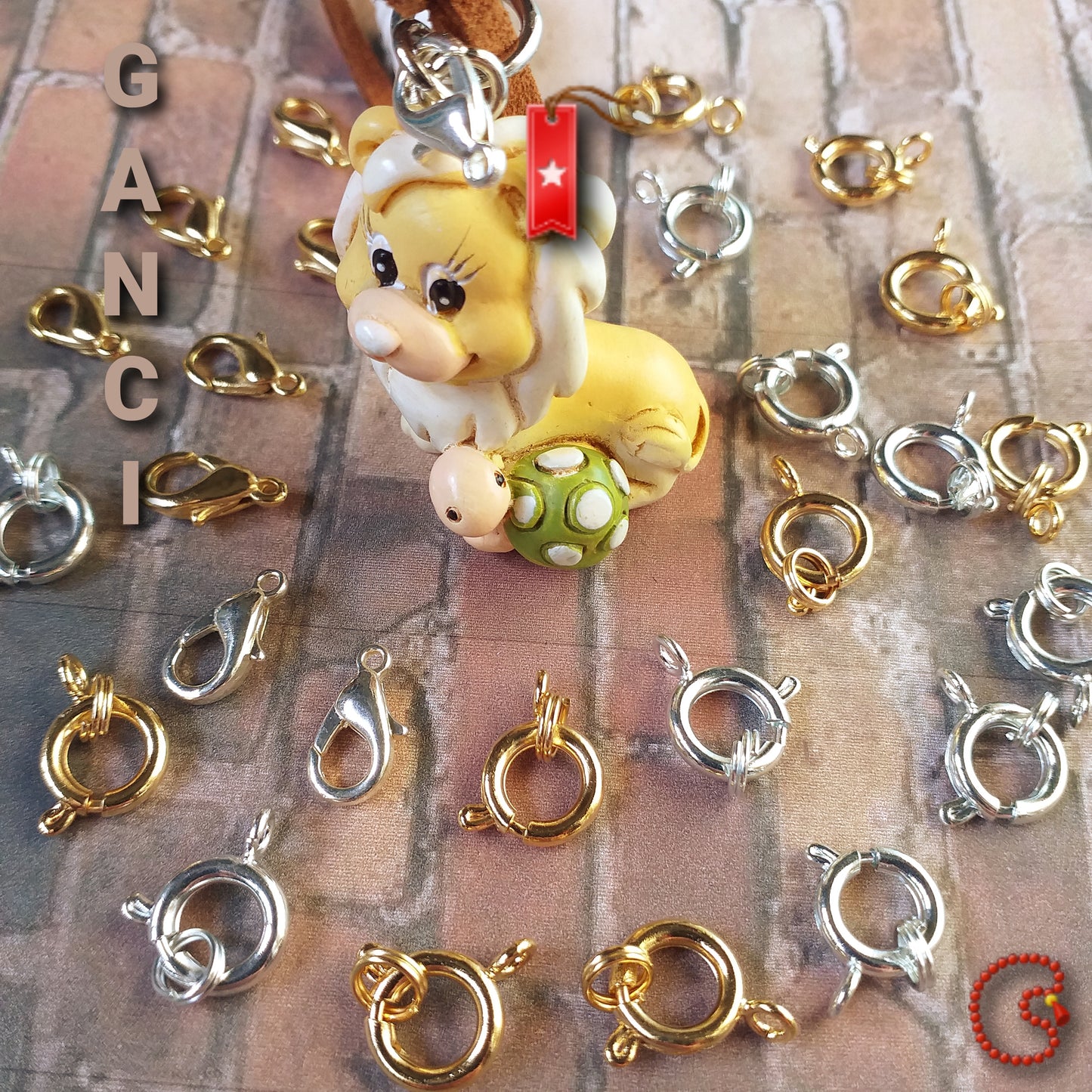 colore oro argento ganci per collane bigiotteria bracciali bijoux chiusure moschettoni ed anello ciondolo leoncino