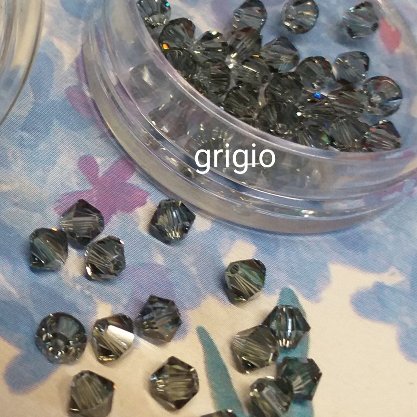 perle swarovski 4 mm per bigiotteria rombetti bicono perline smeraldo grigio uso per lavorazione artigianale orecchini anelli