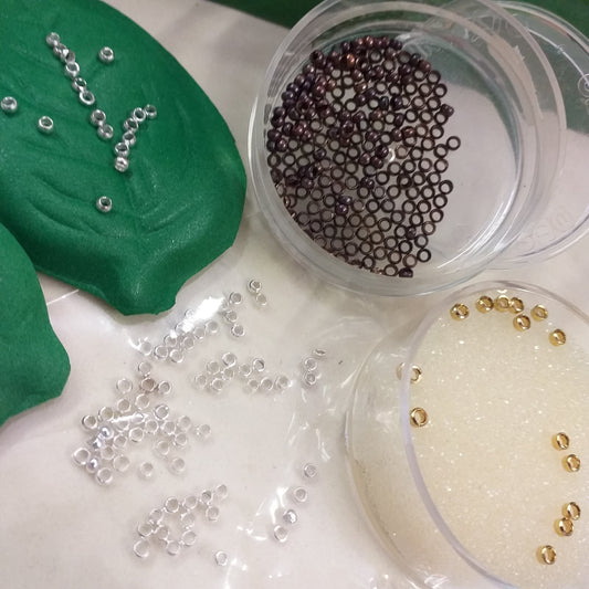 idee e negozio schiaccini fermini per collane bigiotteria componenti accessori perle di metallo chiusura gioielli perline uso minuteria bracciali