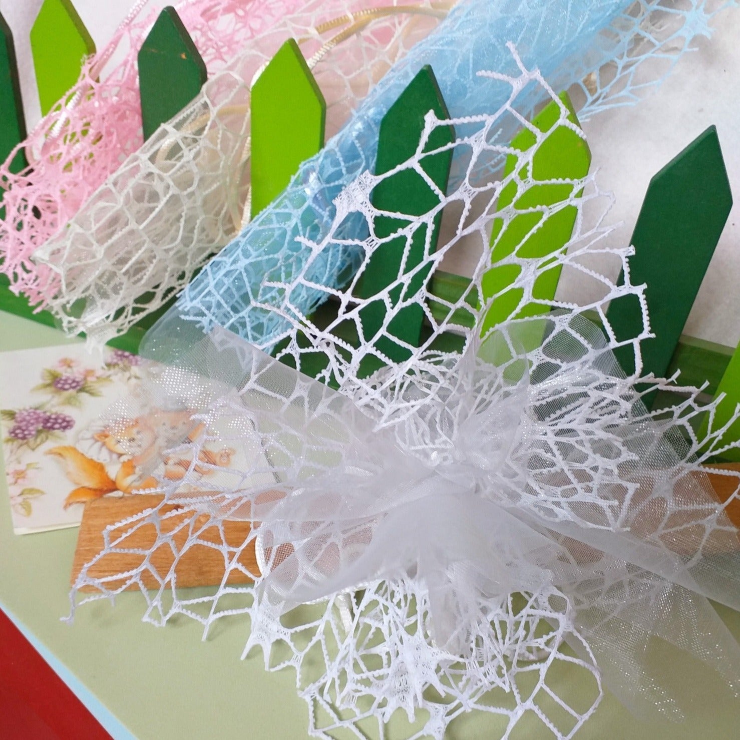 modello coccarda pompon farfalla tulle organza rete pizzo con nastrino tirante uso facile fai da te sacchetti portaconfetti confezionare bomboniere confetti segnaposto packaging fiori secchi profumati lavanda