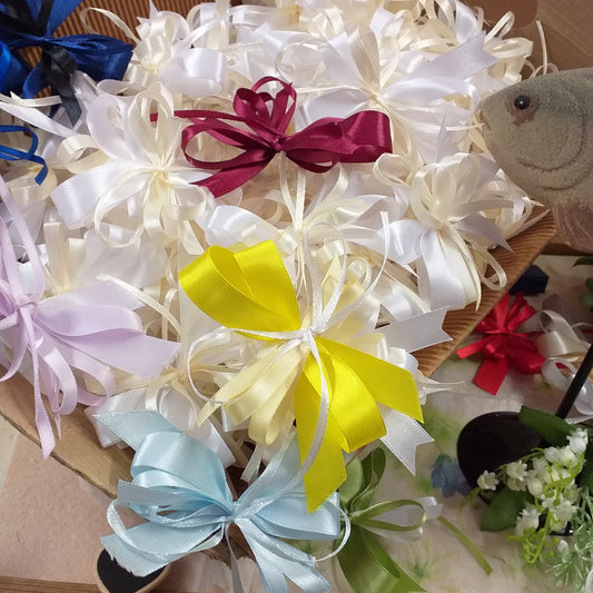 colori pastello idee allestimento matrimonio comunione con fiocchi coccarde fai da te bomboniere segnaposto
