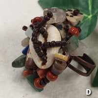 conchiglie pietruzze semi-preziose giada diaspro shop anelli artigianali bigiotteria di perline perle pietre intreccio schema tecnica fatti a mano con filo e basi