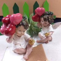statuette angelo cupido san valentino confezione regalo cuoricini palloncini rossi angioletto seduto cuore dorato oggettistica regalo vetrinistica