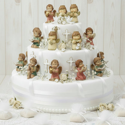 torta scenografica vetrina crema oro colorati in preghiera lettura con cuore candela campanella Croce forma angioletto statuine angeli bomboniere battesimo comunione Cresima idea regalo Natale sorpresa ricordini souvenir oggettini segnaposto chiudipacco allestimento torta scenografica