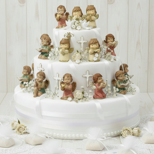 torta scenografica vetrina crema oro colorati in preghiera lettura con cuore candela campanella Croce forma angioletto statuine angeli bomboniere battesimo comunione Cresima idea regalo Natale sorpresa ricordini souvenir oggettini segnaposto chiudipacco allestimento torta scenografica