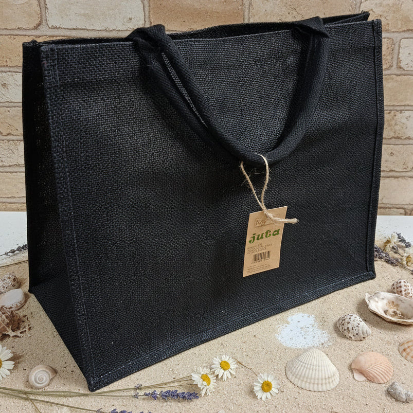 colore nero colorata estiva spiaggia mare piscina juta borsa rettangolare  manici tessuto yuta da decorare rivestire uncinetto tecnica applicazioni personalizzare dipingere colorare ricamare fiori bianchi conchiglie appliquè pizzo nappine pompons
