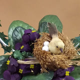 particolari fiori violette e nido uccellino ovetti paglia rafia uso coroncine ghirlande pasquali addobbi decorazioni fai da te vetrinistica