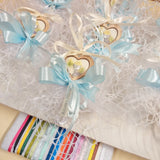 allestimento comunione cresima maschietto bambino bomboniera chiave icona religiosa sacra confezionata confetti sacchetto a rete artigianale coccarda azzurra