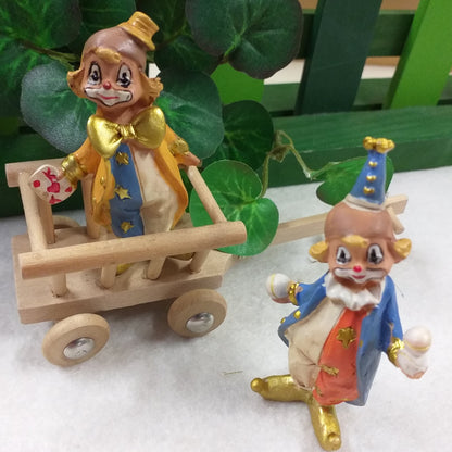 azzurro giallo arancio clown pagliacci statuine bomboniere tema circo personaggi da collezione per ricordini pensierini gadget aprifesta regalini natalizi portafortuna