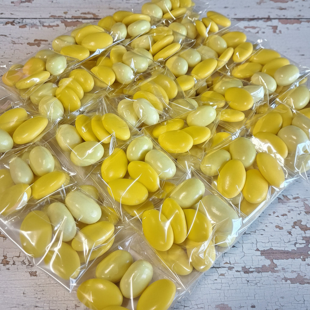 packaging in confetteria bustina sacchetto confezionato confezioni confetti gialli cioccolato e gusto limone cioccomandorla ricordino pensierino gadget regalino festa della donna bomboniere