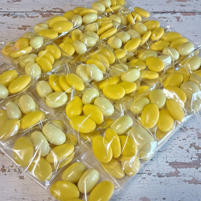 packaging in confetteria bustina sacchetto confezionato confezioni confetti gialli cioccolato e gusto limone cioccomandorla ricordino pensierino gadget regalino festa della donna bomboniere