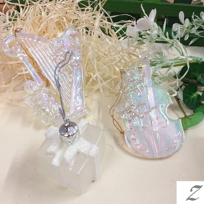pacco regalo violino arpa plastica iridescenti vendita stock lotto di addobbi e decorazioni natalizie per albero Natale da appendere