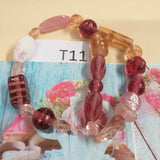 forme miste serie colorate bianco rosa chiaro fucsia perle di vetro veneziano stile Murano vendita a fili shop offerta stock uso fai da te bigiotteria di collane e bracciali