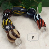 perline lotto P a righe colori misti forme assortite varie serie colorate perle di vetro veneziano stile Murano vendita a fili shop offerta stock
