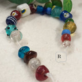perline lotto R colori misti forme assortite per bracciali varie serie colorate perle di vetro veneziano stile Murano vendita a fili shop offerta stock