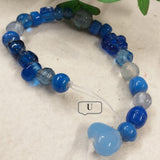 perline lotto U blu turchese forme assortite varie serie colorate perle di vetro veneziano stile Murano vendita a fili shop offerta stock