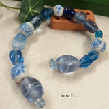 lotto D acquamare bluette forme assortite varie serie colorate perle di vetro veneziano stile Murano vendita a fili shop offerta stock