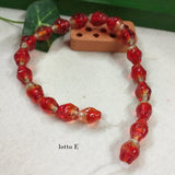 lotto E arancio forme assortite varie serie colorate perle di vetro veneziano stile Murano vendita a fili shop offerta stock