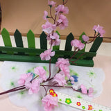 ramo grande lungo 66 cm vetrina fiori di pesco finti artificiali rosa chiaro composizione piantina idea fai da te addobbi decorazioni vetrine negozio primavera pasquale