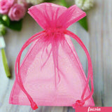 rosa fucsia negozio online sacchetti organza portaconfetti bomboniere bustine con tirante per confezioni regalo portariso sposi packaging lavanda confezionamento pot-pourri fiori profumati