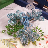 mazzolino bouquet 3 roselline celeste rametti foglie verdi idea regalo perline bomboniere e natale segnaposto
