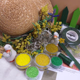 hobby perline vetro conteria veneziana di perle rocailles gialle verdi per creare mimosa kit fai da te papere bianche fili steli guttaperca stemtex verde istruzioni foto