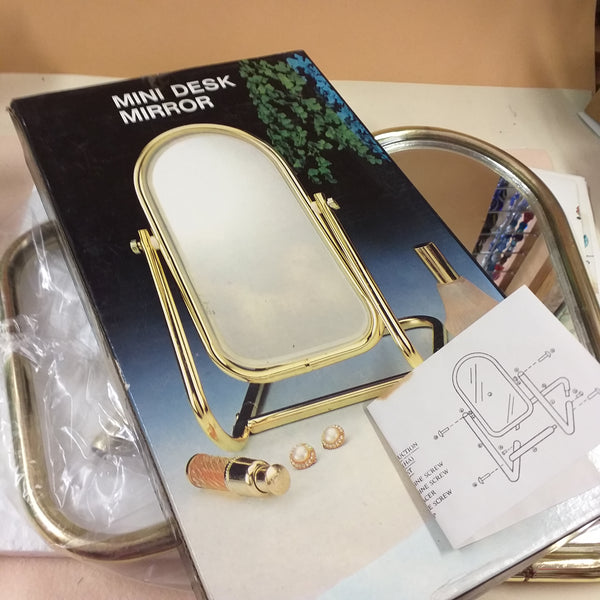 schema di montaggio kit mini desk mirror specchio da tavolo con base da appoggio ovale di metallo colore dorato con istruzioni 