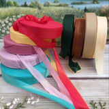 tiffani-mare lilla malva giallo mais rosso lampone smeraldino marrone corda tinta carne vetrina shop offerta vendita fettuccia stafil maglina jersey poliammide lycra soft-elastica colori moda estiva 2025 alta pizza larga piatta 4 cm uso borse uncinetto clutch bags shopper e sacca mare crochet amigurumi cestini