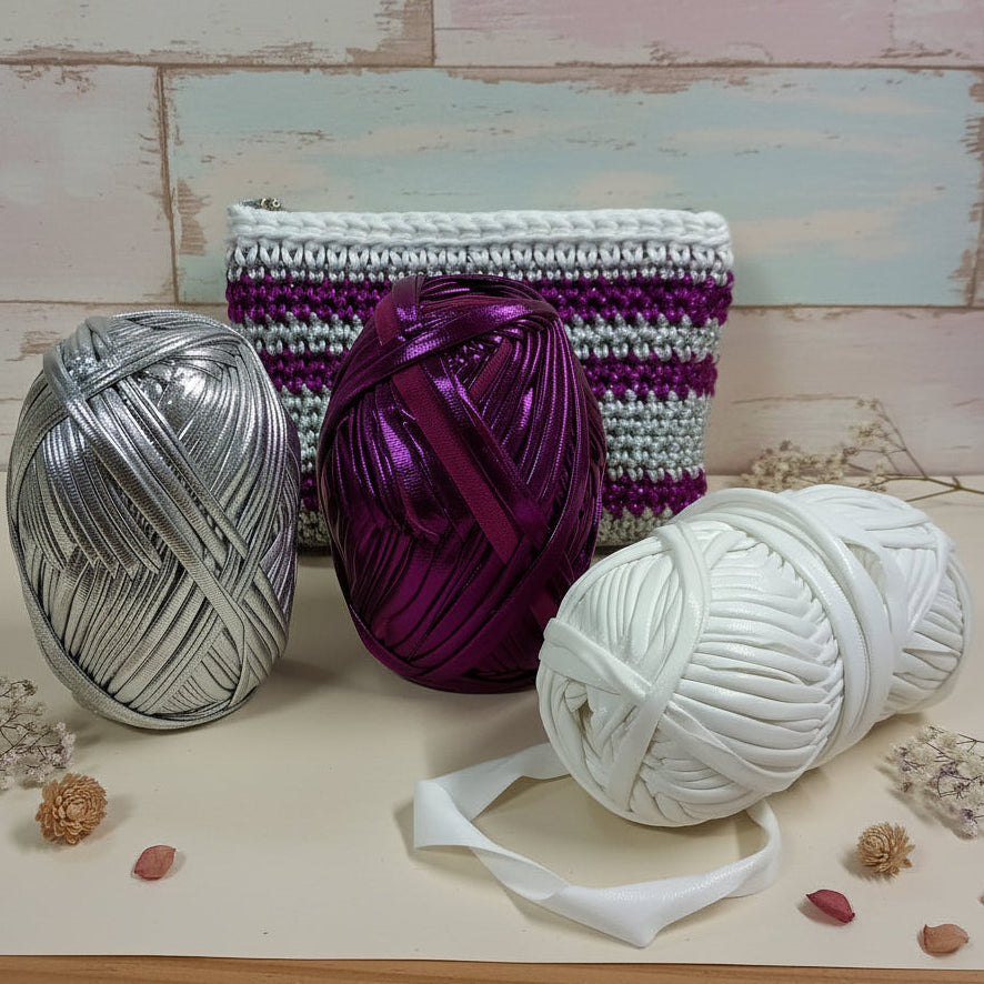 bianco argento viola cangiante madreperlato shop MAS fettuccia lycra laminata metallizzata lamè lurex iridescente gomitoli uso uncinetto ferri da maglia pochette clutch bags portamonete portaocchiali