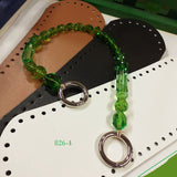 pietre di vetro plastica verde-chiaro colorate maniglia bijoux manici perle perline con moschettoni anelloni apribili rotondi uso creare borse artigianali fai da te uncinetto accessori cordino fettuccia corda macramè