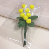 bustina trasparente con pick mazzolino bouquet piccolo miniatura fiori mimosa finta artificiale di ciniglia gialla pistilli  foglie uso segnaposto chiudipacco regalo decorazioni fioristi festa della donna 8 marzo