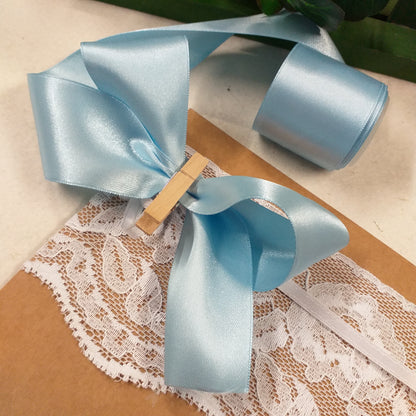 come creare fiocchi con nastri di raso decorativi cucito creativo addobbi confezioni regalo celeste packaging bomboniere bouquet sposa fiocco nascita bimbo maschietto bebè baby